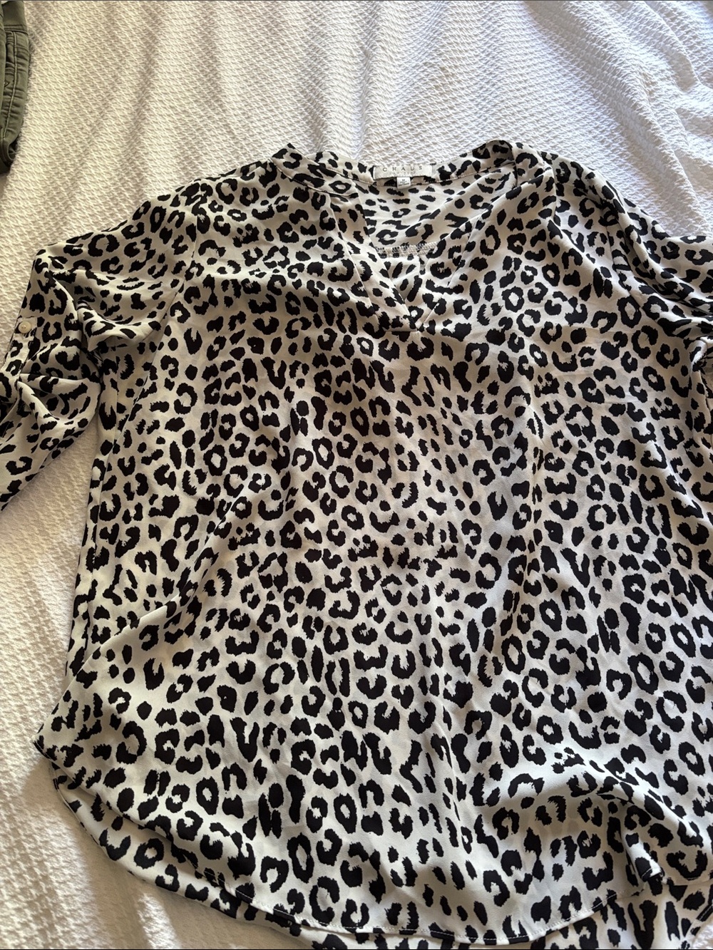 Women’s black and white leopard print blouse